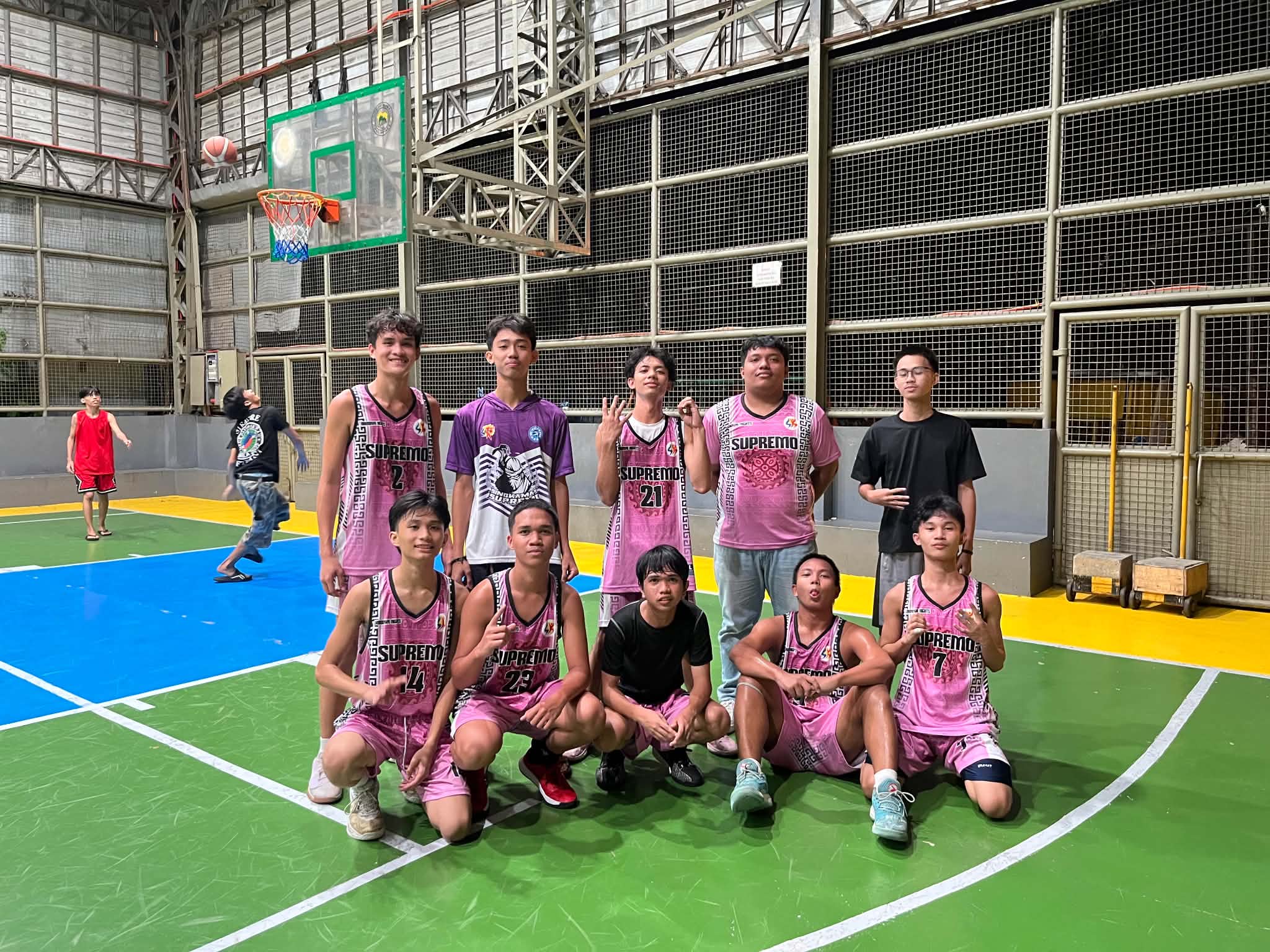 Basketball team photo on court