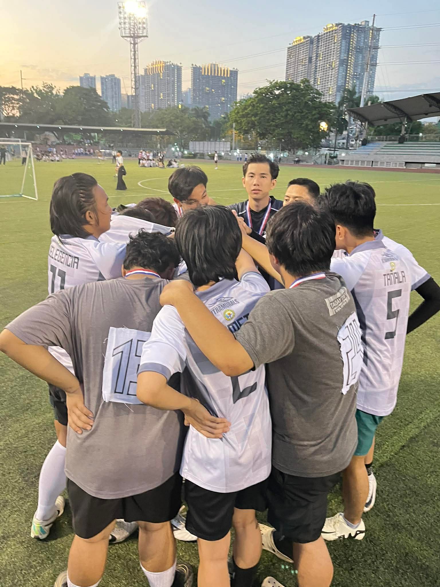Football team huddle after a game