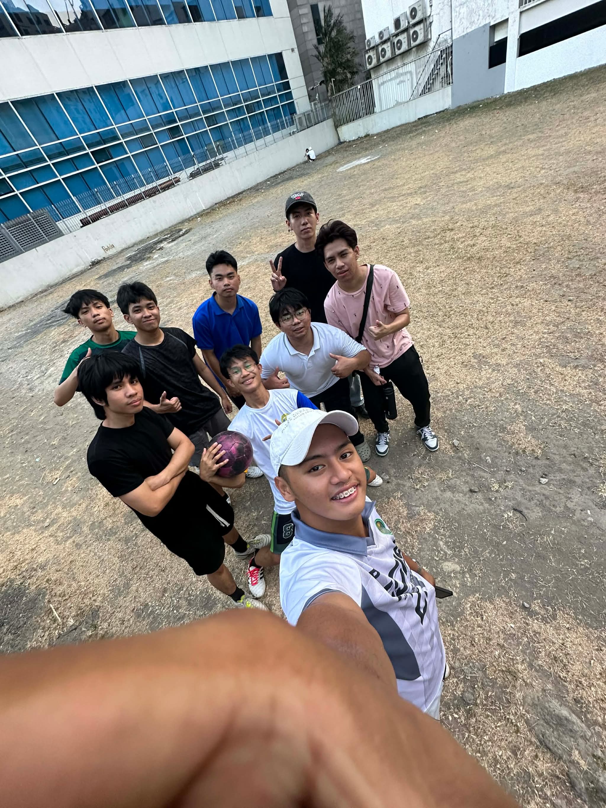 Friends taking a group photo outside
